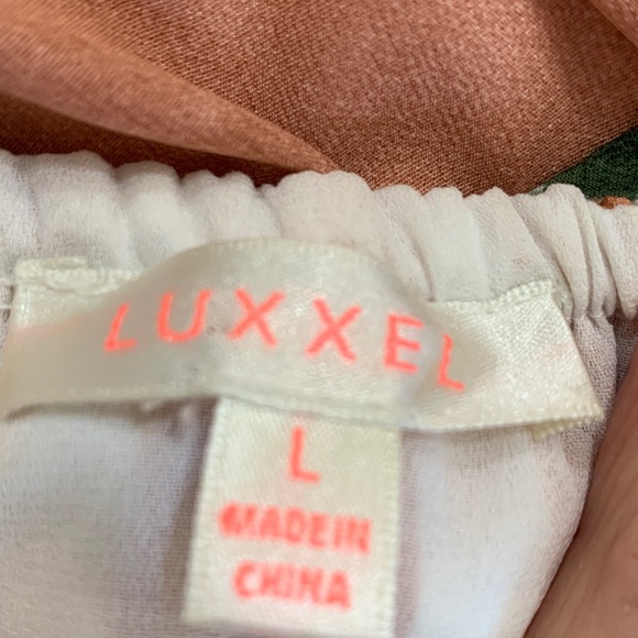 Luxxel summer stray dress size large
Fully lined - Picture 7 of 9